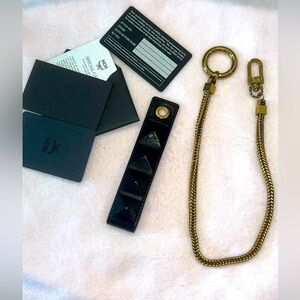 MCM Chain & Black/Red Leather Loop NWT( Authenticity Cards)